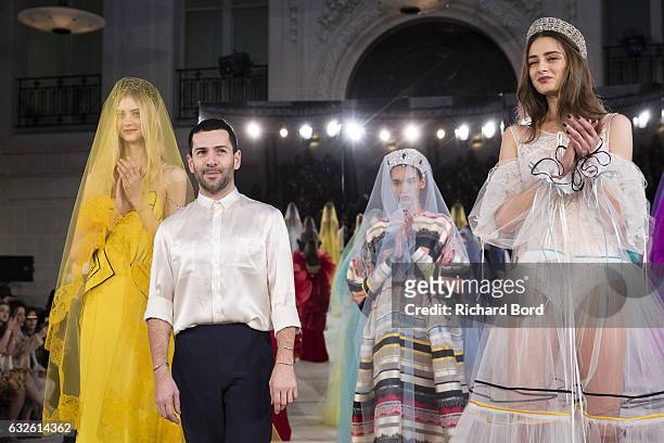 Designer Alexis Mabille pose with models after the Alexis Mabille Spring Summer 2017 show as part of Paris Fashion Week on January 24, 2017 in Paris,...