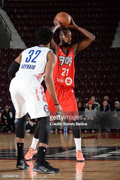Leslie of the Raptors 905 looks to pass the ball by Lazar Hayward of the Long Island Nets as part of 2017 NBA D-League Showcase at the Hershey Centre...