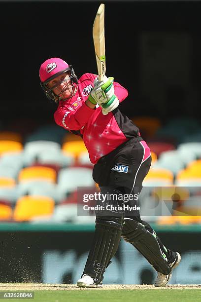 Alyssa Healy of the Sixers bats during the Women's Big Bash League semi final match between the Sydney Sixers and the Hobart Hurricanes at The Gabba...