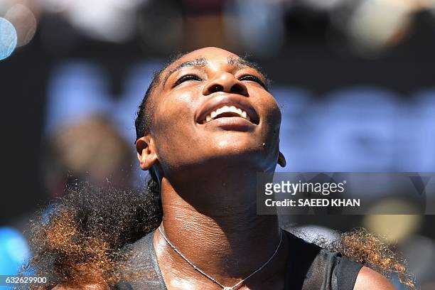 Serena Williams of the US celebrates her victory against Britain's Johanna Konta in their women's singles quarter-final match on day ten of the...