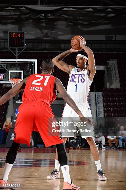 Chris McCullough of the Long Island Nets looks to pass the ball over CJ Leslie of the Raptors 905 as part of 2017 NBA D-League Showcase at the...