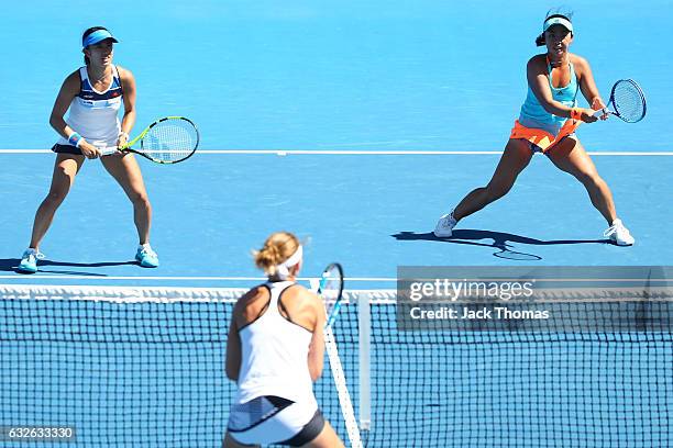 Eri Hozumi and Miyu Kato of Japan compete in their quarterfinal match against Bethanie Mattek-Sands of the United States and Lucie Safarova of the...