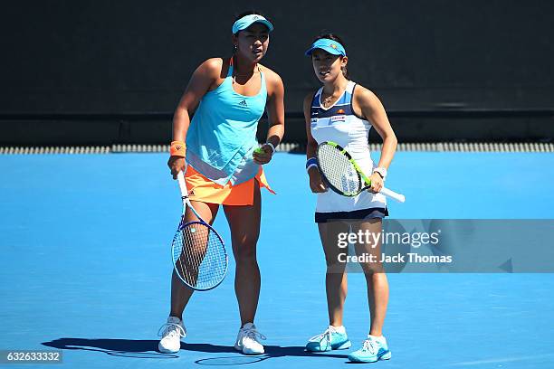 Eri Hozumi and Miyu Kato of Japan compete in their quarterfinal match against Bethanie Mattek-Sands of the United States and Lucie Safarova of the...