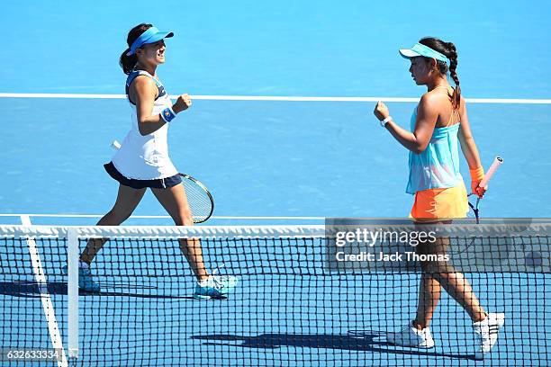 Eri Hozumi and Miyu Kato of Japan compete in their quarterfinal match against Bethanie Mattek-Sands of the United States and Lucie Safarova of the...