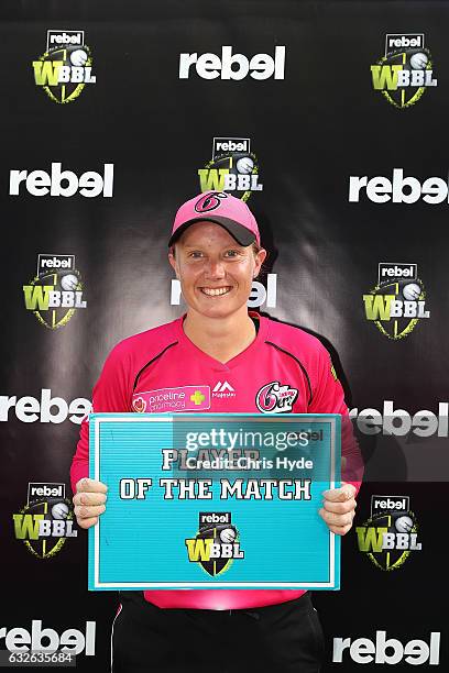 Alyssa Healy of the Sixers is awarded player of the match after the Women's Big Bash League semi final match between the Sydney Sixers and the Hobart...