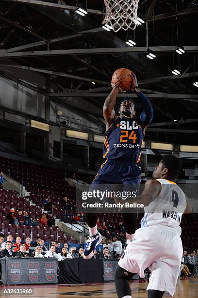 Jermaine Taylor of the Salt Lake City Stars goes up for the shot over Wes Washpun of the Iowa Energy as part of 2017 NBA D-League Showcase at the...