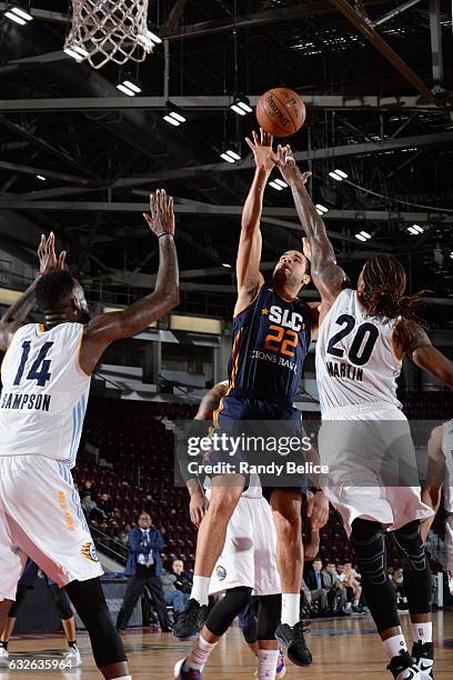 Brien of the Salt Lake City Stars goes up for the shot against JaKarr Sampson and Cartier Martin of the Iowa Energy as part of 2017 NBA D-League...