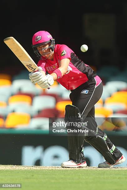 Angela Reaks of the Sixers bats during the Women's Big Bash League semi final match between the Sydney Sixers and the Hobart Hurricanes at The Gabba...
