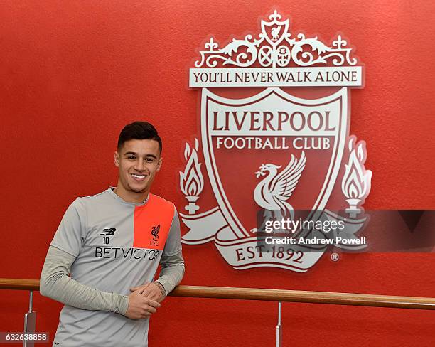 Philippe Coutinho of Liverpool poses after signing a new contract at Melwood Training Ground on January 24, 2017 in Liverpool, England.