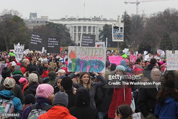 Tens of thousands march to the White House during the Women's March on Washington, January 21, 2017.