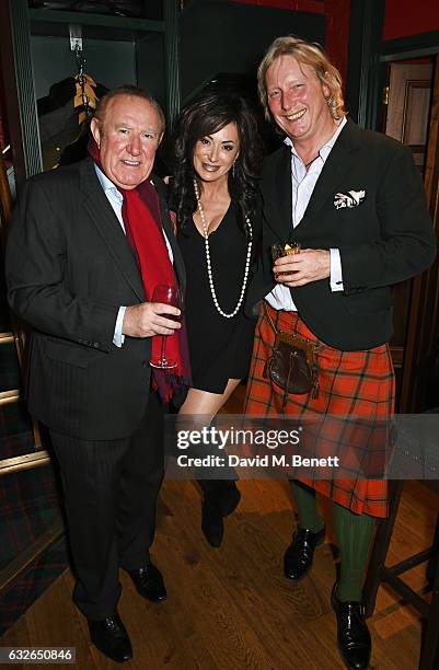 Andrew Neil, Nancy Dell'Olio and Ranald Macdonald attend Burns Night at Boisdale Of Mayfair with Macallan on January 24, 2017 in London, England.