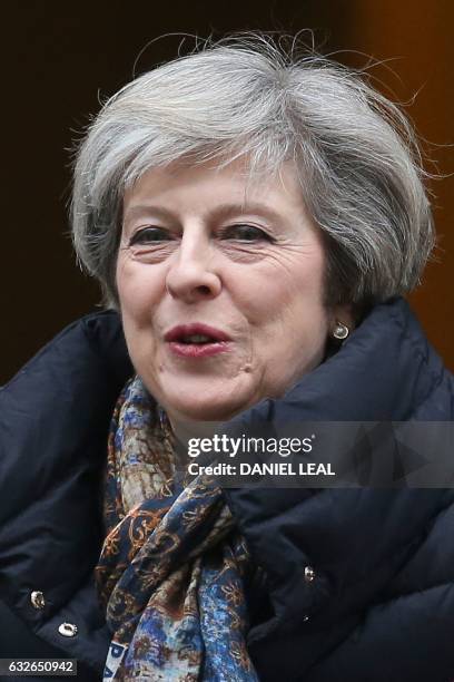 Britain's Prime Minister Theresa May leaves 10 Downing Street in central London on January 25, 2017 to attend the weekly Prime Minister's Questions...