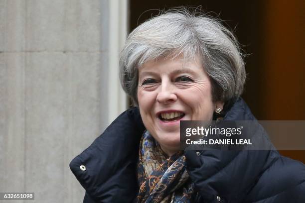 Britain's Prime Minister Theresa May leaves 10 Downing Street in central London on January 25, 2017 to attend the weekly Prime Minister's Questions...
