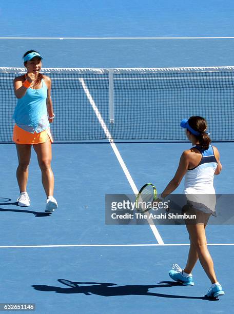 Eri Hozumi and Miyu Kato of Japan compete in their quarterfinal match against Bethanie Mattek-Sands of the United States and Lucie Safarova of the...