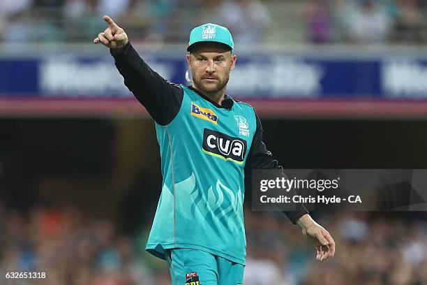 Brendon McCullum of the Heat points during the Big Bash League semi final match between the Brisbane Heat and the Sydney Sixers at the The Gabba on...