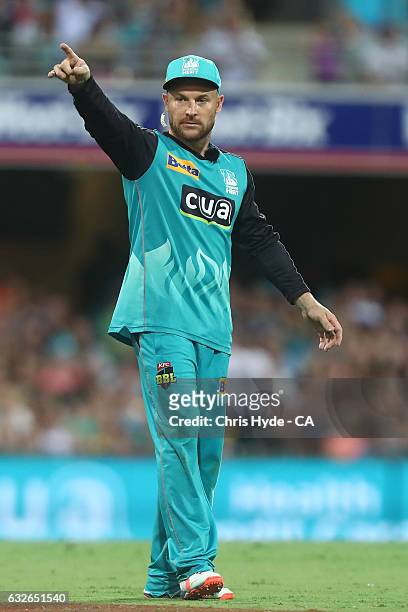 Brendon McCullum of the Heat points during the Big Bash League semi final match between the Brisbane Heat and the Sydney Sixers at the The Gabba on...