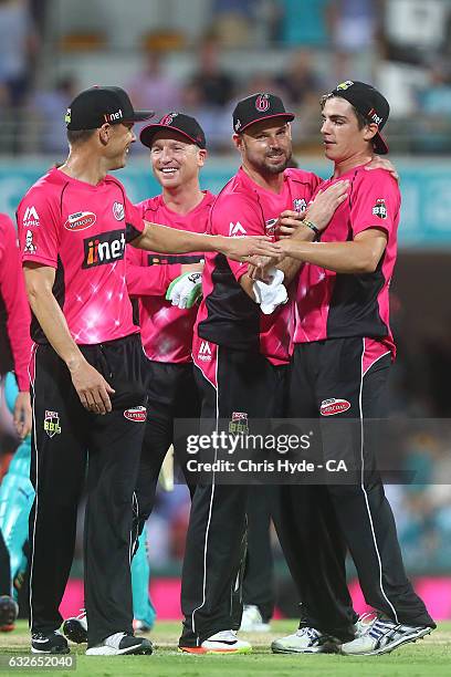 Sixers celebrate winning the Big Bash League semi final match between the Brisbane Heat and the Sydney Sixers at the The Gabba on January 25, 2017 in...