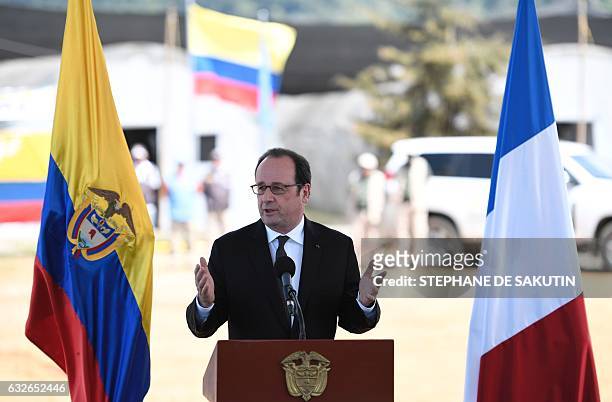 French President Francois Hollande gestures as he delivers speech during a joint press conference with Colombian President in Caldono, Valle del...