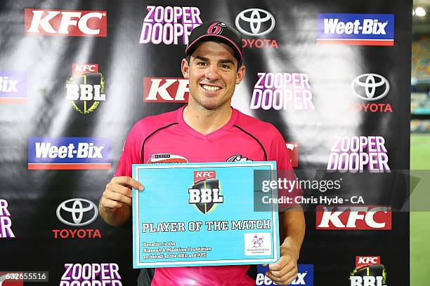 Moises Henriques of the Sixers is awarded player of the match after winning the Big Bash League semi final match between the Brisbane Heat and the...