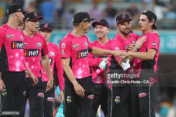Sixers celebrate winning the Big Bash League semi final match between the Brisbane Heat and the Sydney Sixers at the The Gabba on January 25, 2017 in...