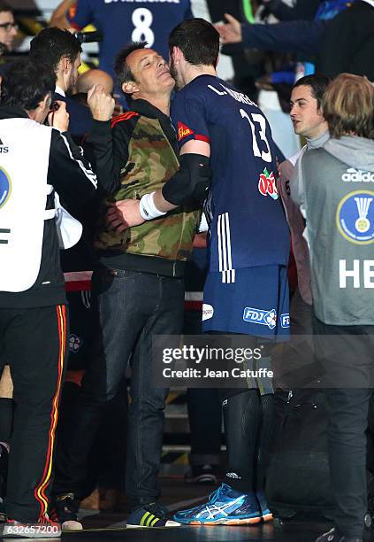 Jean-Luc Reichmann greets Ludovic Fabregas of France following the 25th IHF Men's World Championship 2017 Quarter Final match between France and...