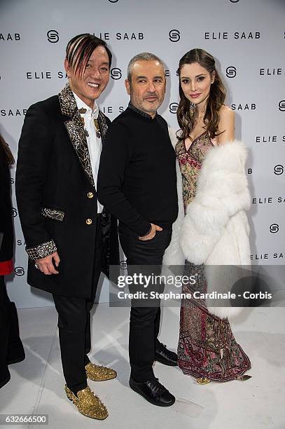 Stephen Hung, Fashion designer Elie Saab and Deborah Hung pose Backstage after the Elie Saab Spring Summer 2017 show as part of Paris Fashion Week on...