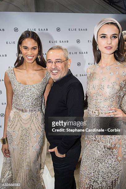 Fashion designer Elie Saab and models pose Backstage after the Elie Saab Spring Summer 2017 show as part of Paris Fashion Week on January 25, 2017 in...