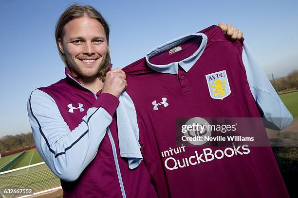 New signing Birkir Bjarnason of Aston Villa poses for a picture at the club's training ground at Bodymoor Heath on January 25, 2017 in Birmingham,...