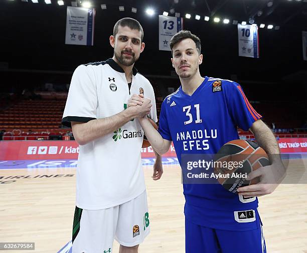 Adrien Moerman, #18 of Darussafaka Dogus Istanbul and Thomas Heurtel, #31 of Anadolu Efes Istanbul pictured prior to the 2016/2017 Turkish Airlines...