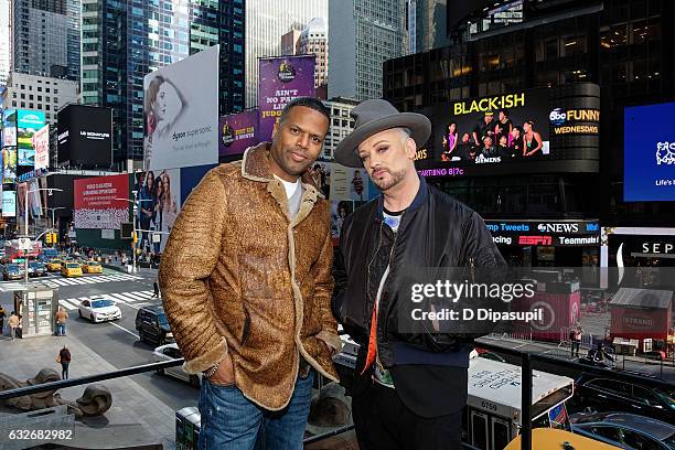 Calloway and Boy George pose on the set of "Extra" at the Hard Rock Cafe, Times Square on January 25, 2017 in New York City.