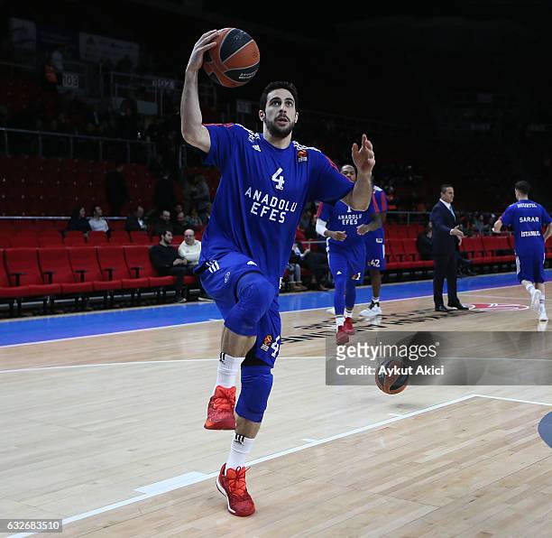 Dogus Balbay, #4 of Anadolu Efes Istanbul warms-up prior to in action during the 2016/2017 Turkish Airlines EuroLeague Regular Season Round 19 game...