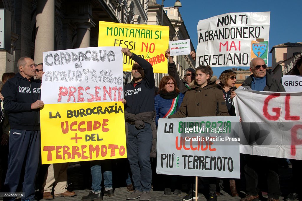 Protesters holding placards during the protest. A protest in...