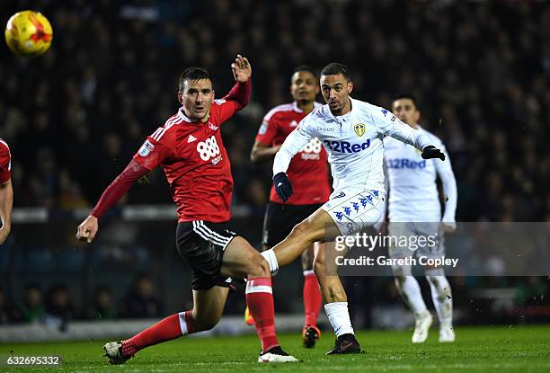 Kemar Roofe of Leeds United shoots past Jack Hobbs of Nottingham Forest during the Sky Bet Championship match between Leeds United and Nottingham...