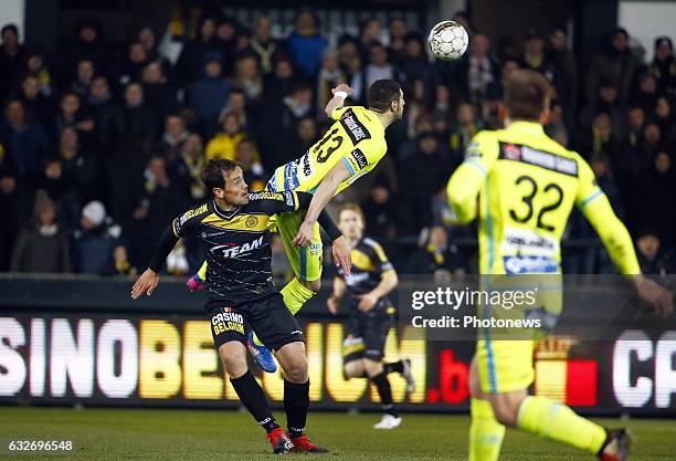 Tom De Sutter forward of Sporting Lokeren and Stefan Mitrovic defender of KAA Gent pictured during the Jupiler Pro League match between Sporting...