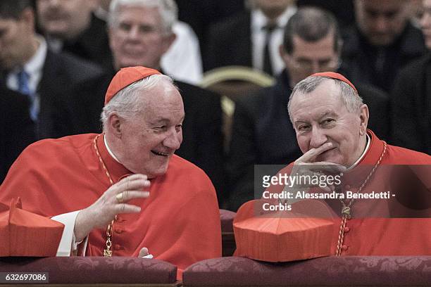 Cardinal Marc Ouellet and Vatican State Secretary Pietro Parolin talks as Pope Francis leads the Vespers mass on the occasion of the solemnity of the...