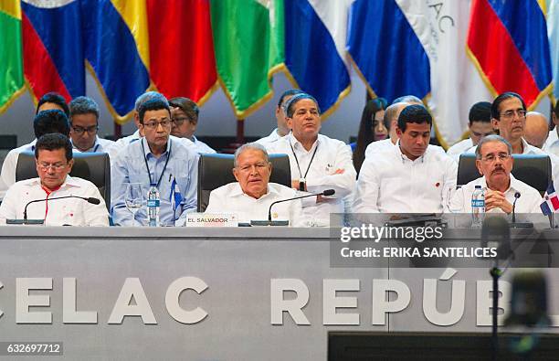 Dominican Republic's President Danilo Medina and Salvadorean President Salvador Sanchez Ceren , attend the plenary session during the Fifth Summit of...