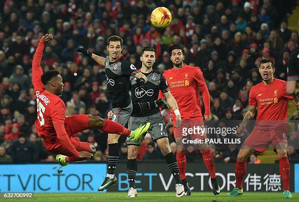 Liverpool's English striker Daniel Sturridge shoots but fails to score during the EFL Cup semi-final second-leg football match between Liverpool and...