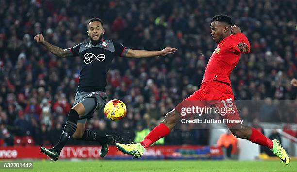 Daniel Sturridge of Liverpool is closed down by Nathan Redmond of Southampton during the EFL Cup Semi-Final Second Leg match between Liverpool and...