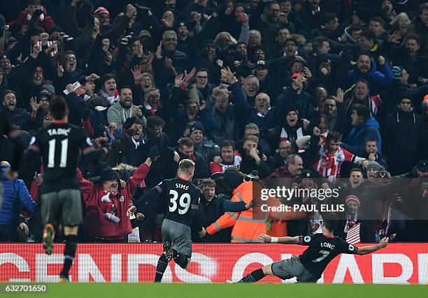 Southampton's Irish striker Shane Long celebrates scoring his team's first goal during the EFL Cup semi-final second-leg football match between...