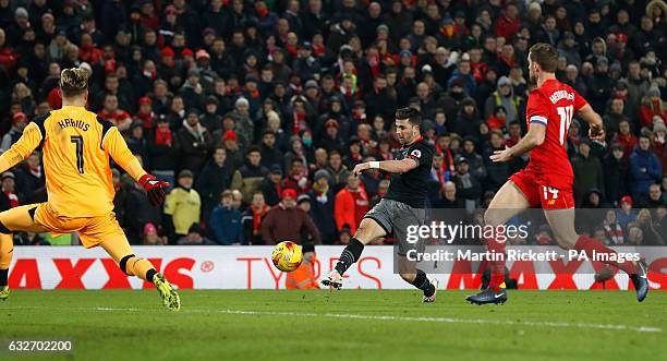 Southampton's Shane Long scores his side's first goal during the EFL Cup Semi Final, Second Leg match at Anfield, Liverpool.