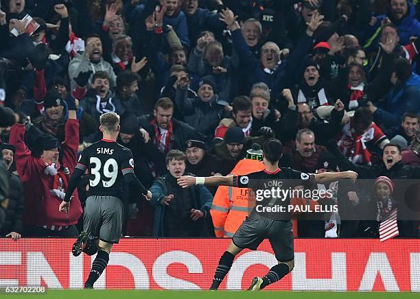 Southampton's Irish striker Shane Long celebrates scoring his team's first goal during the EFL Cup semi-final second-leg football match between...