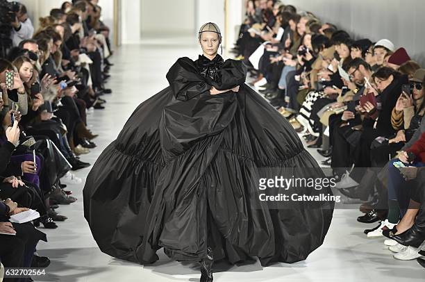 Model walks the runway at the Maison Margiela Spring Summer 2017 fashion show during Paris Haute Couture Fashion Week on January 25, 2017 in Paris,...