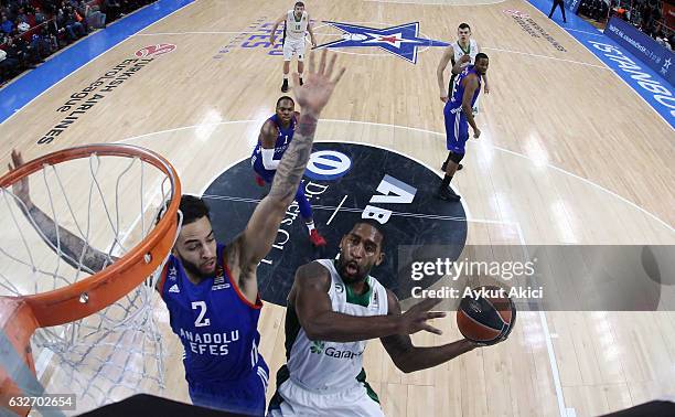 Bradley Wanamaker, #11 of Darussafaka Dogus Istanbul competes with Tyler Honeycutt, #2 of Anadolu Efes Istanbul during the 2016/2017 Turkish Airlines...