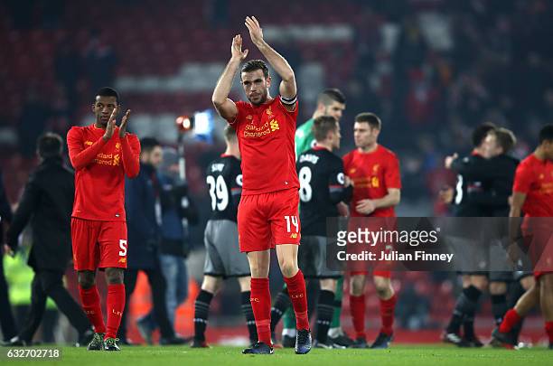 Jordan Henderson of Liverpool applauds supporters following defeat in the EFL Cup Semi-Final Second Leg match between Liverpool and Southampton at...