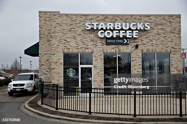 Starbucks Corp. Coffee shop stands in Peoria, Illinois, U.S., on Wednesday, Jan. 25, 2017. Starbucks Corp. Is expected to release earnings figures on...