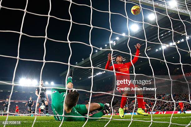 Fraser Forster of Southampton makes a save during the EFL Cup Semi-Final Second Leg match between Liverpool and Southampton at Anfield on January 25,...