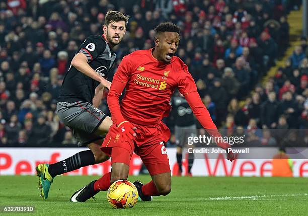 Divock Origi of Liverpool goes down in the Southampton box for a penalty claim not given in the last minute during the EFL Cup Semi-Final second leg...