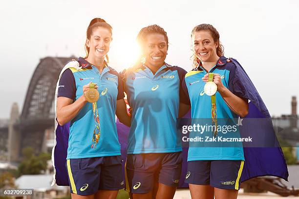 Alicia Quirk, Ellia Green and Emilee Cherry pose with Olympic Gold Medals at Observatory Hill on January 26, 2017 in Sydney, Australia. The...