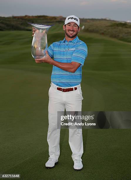 Andrew Landry holds the winner's trophy after winning The Bahamas Great Abaco Classic at the Abaco Club on January 25, 2017 in Great Abaco, Bahamas.