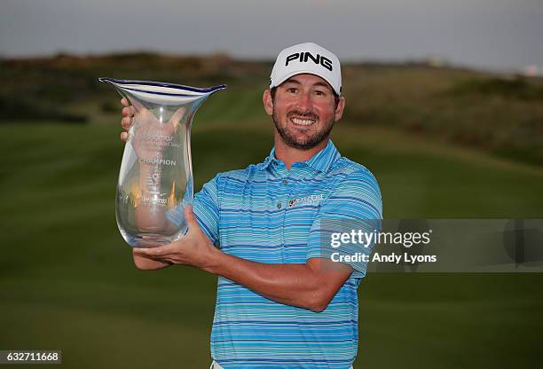 Andrew Landry holds the winner's trophy after winning The Bahamas Great Abaco Classic at the Abaco Club on January 25, 2017 in Great Abaco, Bahamas.